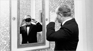 Truman Capote, modeling the mask for his famous Black and White Ball, 1966 Photo taken from Jewels du Jour