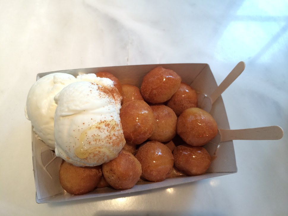 These Greek donuts are just amazing - perfectly crispy on the outside and chewy on the inside with the tanginess of the ice cream and the sweetness of the honey. *faints with desire*